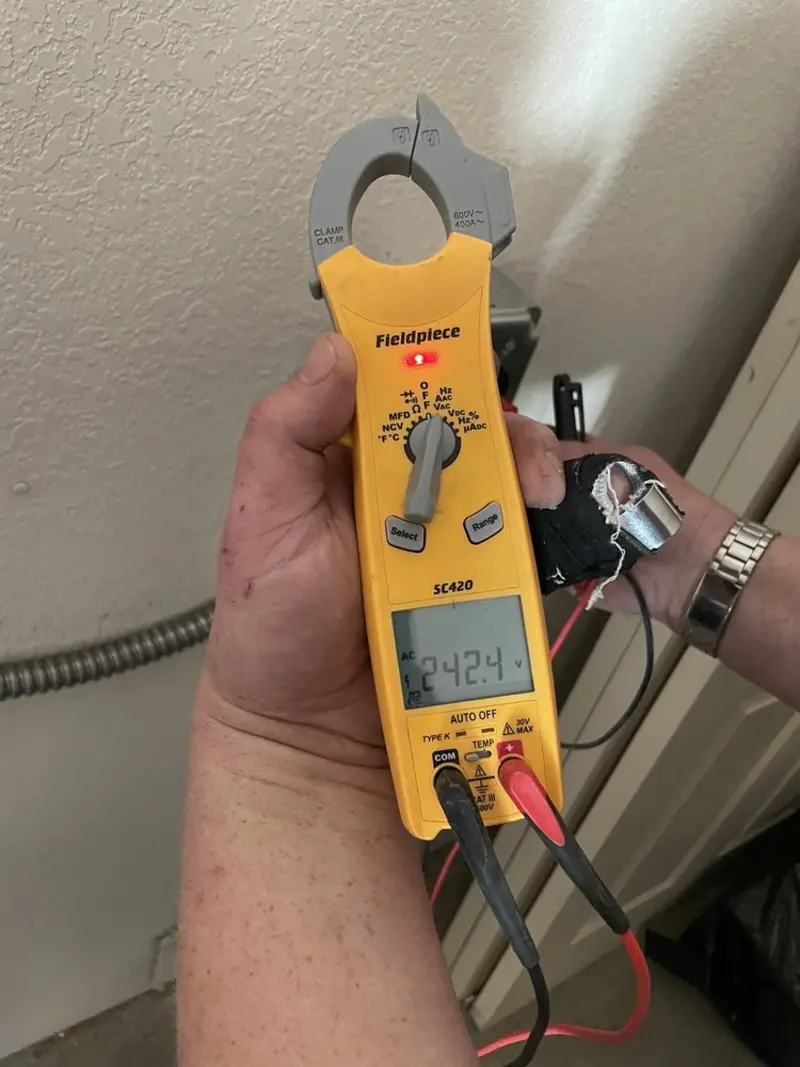 Voltage testing with clamp meter during Generator Installation in Wilmington Island